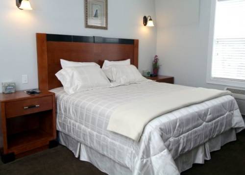 Imagen de la habitación del Hotel Crescent Suites. Foto 8