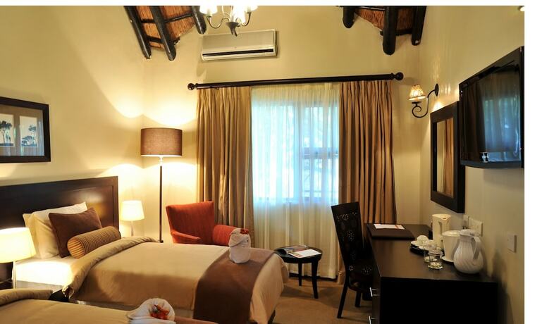 Imagen de la habitación del Hotel Cresta Riley's. Foto 15