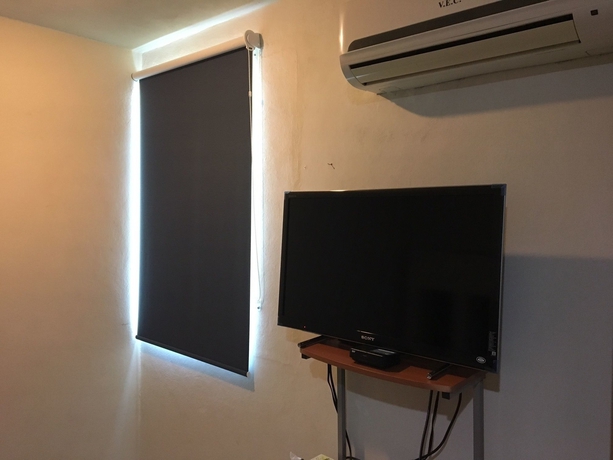 Imagen de la habitación del Hotel Crisantemos Suite. Foto 6