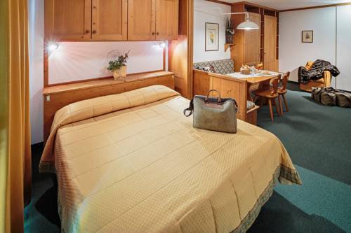 Imagen de la habitación del Hotel Cristallino D'ampezzo. Foto 10