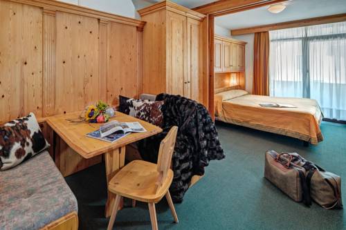 Imagen de la habitación del Hotel Cristallino D'ampezzo. Foto 11