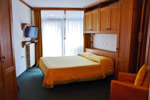 Imagen de la habitación del Hotel Cristallino D'ampezzo. Foto 12