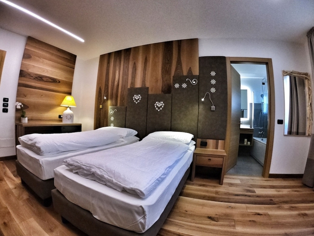 Imagen de la habitación del Hotel Cristallo, Canazei. Foto 3