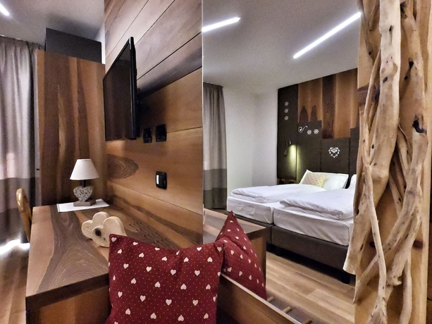 Imagen de la habitación del Hotel Cristallo, Canazei. Foto 8