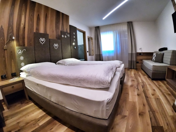 Imagen de la habitación del Hotel Cristallo, Canazei. Foto 14
