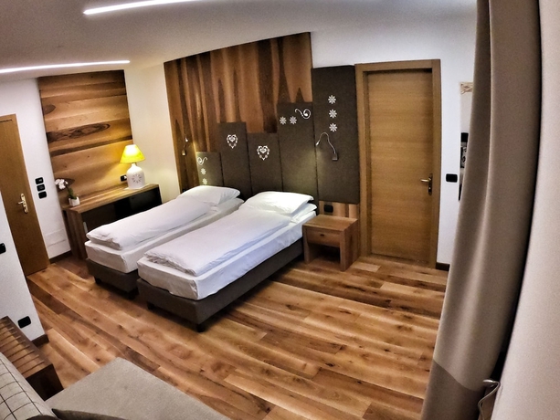 Imagen de la habitación del Hotel Cristallo, Canazei. Foto 18