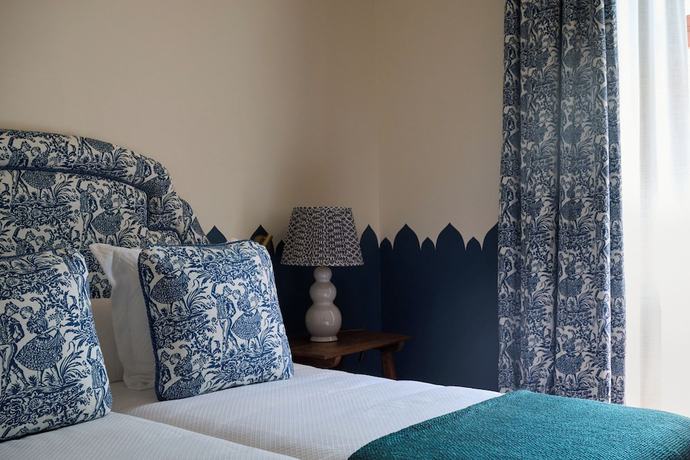 Imagen de la habitación del Hotel Cristine Bedfor Sevilla Boutique. Foto 12
