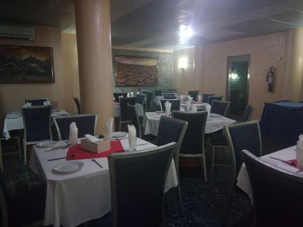 Imagen del bar/restaurante del Hotel Crocodiles And Restaurant Limited. Foto 2