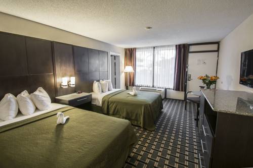 Imagen de la habitación del Hotel Croix Grand. Foto 12