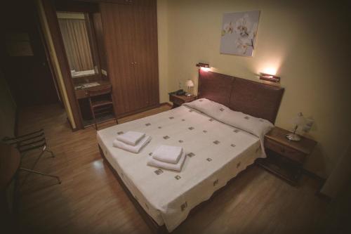 Imagen de la habitación del Hotel Cronos, Arta. Foto 7