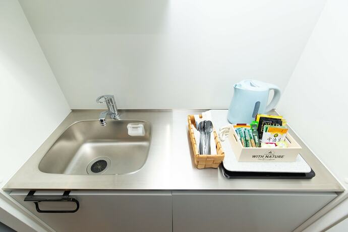 Imagen de la habitación del Hotel Cross Bridge Ikebukuro. Foto 29