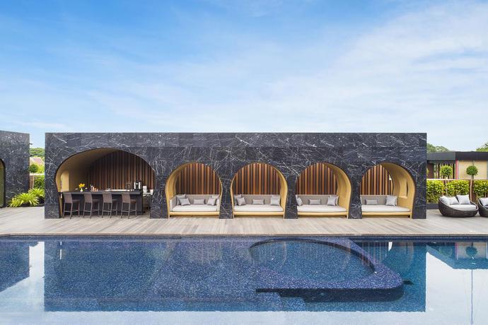 Imagen de la piscina del Hotel Cross Chiang Mai Riverside. Foto 9