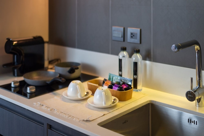 Imagen de la habitación del Hotel Cross Pattaya Oceanphere. Foto 12