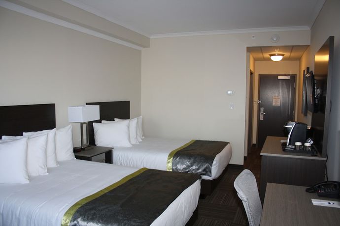 Imagen de la habitación del Hotel Crossroads Inn And Suites. Foto 6