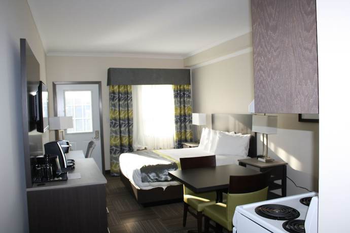 Imagen de la habitación del Hotel Crossroads Inn And Suites. Foto 7