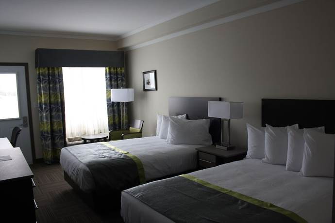 Imagen de la habitación del Hotel Crossroads Inn And Suites. Foto 8