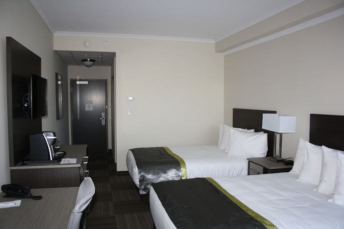 Imagen de la habitación del Hotel Crossroads Inn And Suites. Foto 12