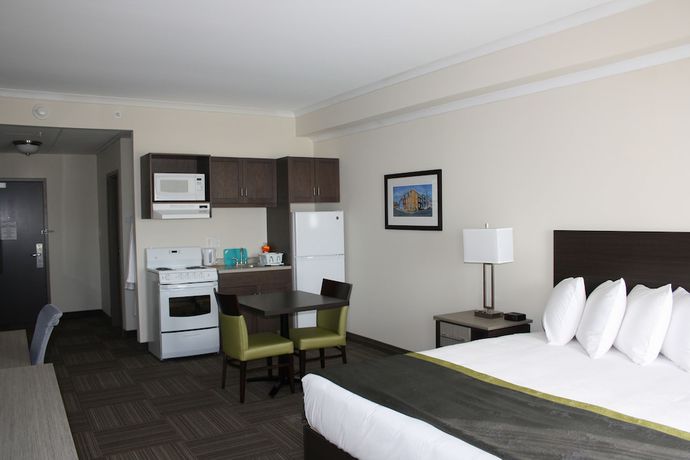 Imagen de la habitación del Hotel Crossroads Inn And Suites. Foto 14