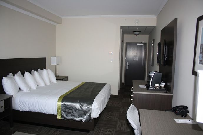 Imagen de la habitación del Hotel Crossroads Inn And Suites. Foto 15