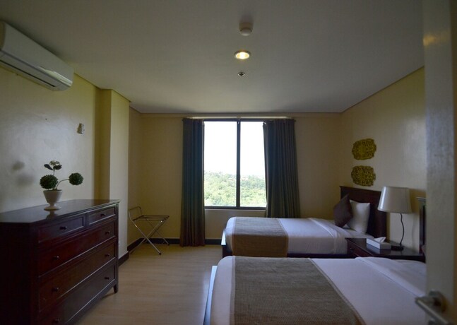 Imagen de la habitación del Hotel Crosswinds Resort Suites. Foto 28