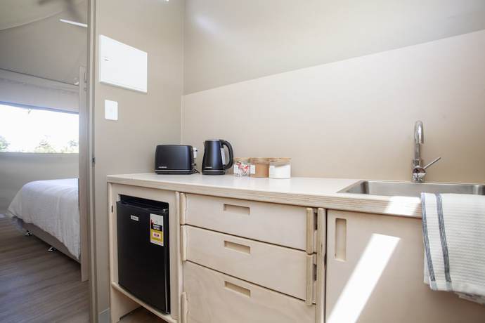Imagen de la habitación del Hotel Crowdy Bay Eco Resort. Foto 7