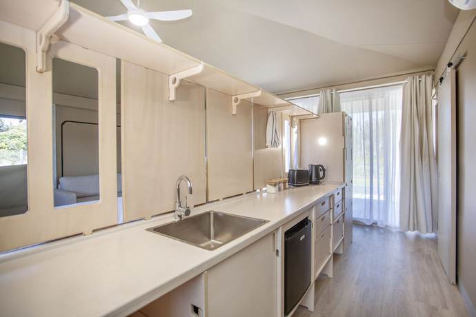 Imagen de la habitación del Hotel Crowdy Bay Eco Resort. Foto 12