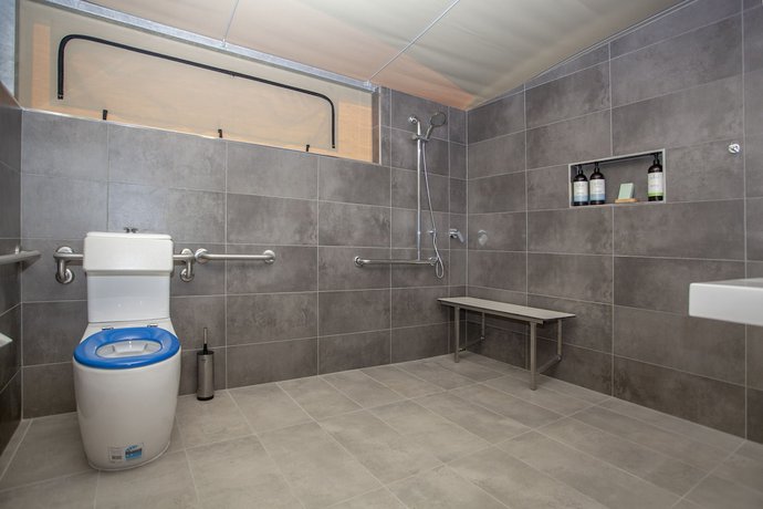Imagen de la habitación del Hotel Crowdy Bay Eco Resort. Foto 18