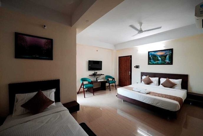 Imagen de la habitación del Hotel Crown Castle, Guwahati. Foto 5