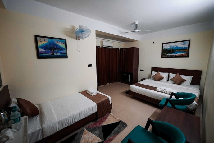 Imagen de la habitación del Hotel Crown Castle, Guwahati. Foto 8