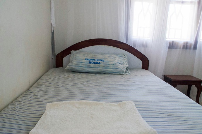 Imagen de la habitación del Hotel Crown Hoima. Foto 3