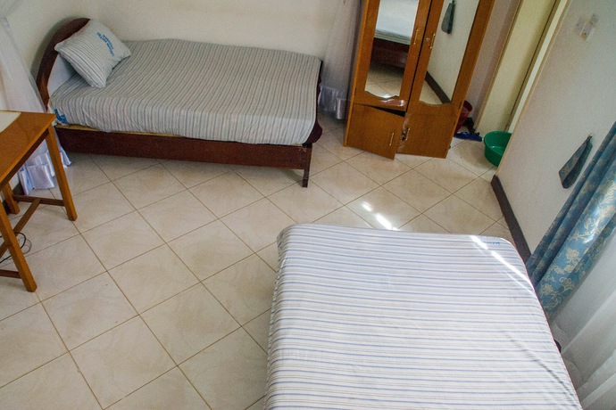 Imagen de la habitación del Hotel Crown Hoima. Foto 7