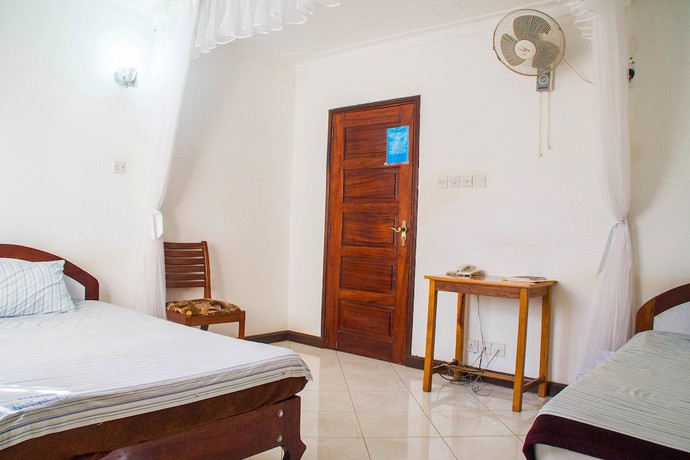 Imagen de la habitación del Hotel Crown Hoima. Foto 8