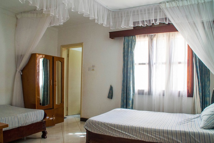 Imagen de la habitación del Hotel Crown Hoima. Foto 9