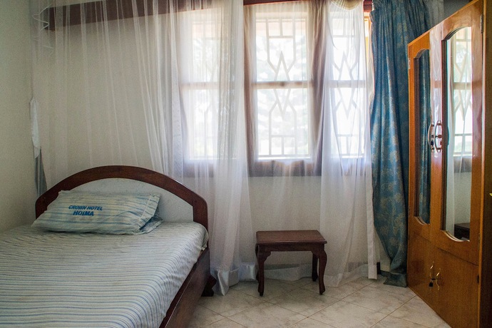 Imagen de la habitación del Hotel Crown Hoima. Foto 10