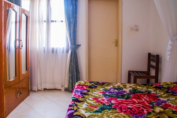 Imagen de la habitación del Hotel Crown Hoima. Foto 12