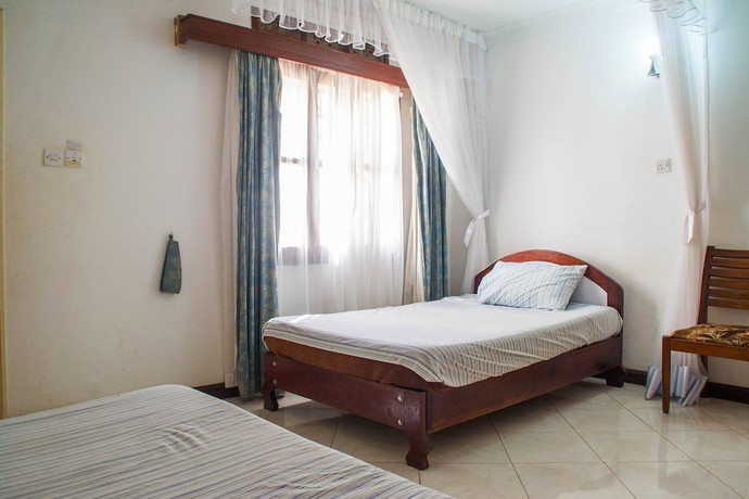 Imagen de la habitación del Hotel Crown Hoima. Foto 13