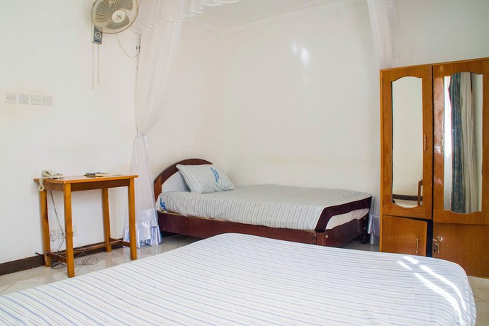 Imagen de la habitación del Hotel Crown Hoima. Foto 14