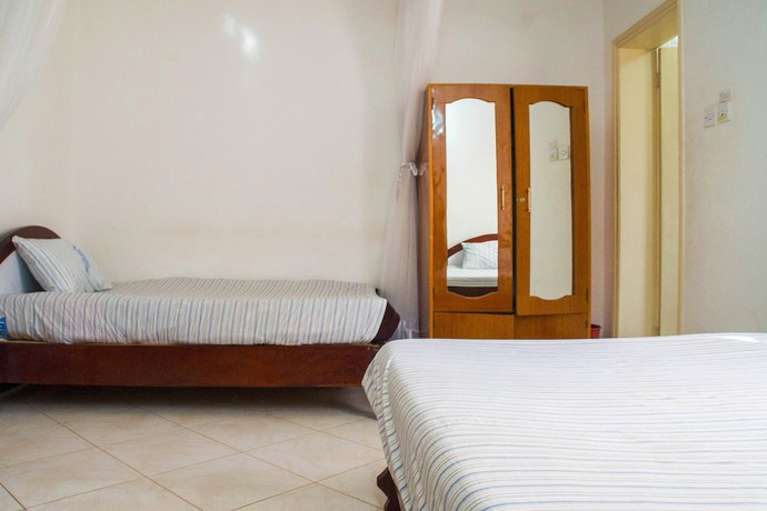 Imagen de la habitación del Hotel Crown Hoima. Foto 18