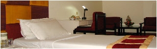 Imagen de la habitación del Hotel Crown Hotel, Ahmedabad. Foto 7