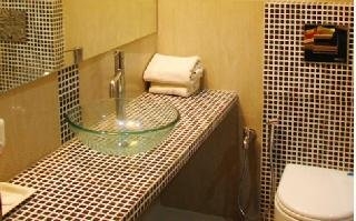 Imagen de la habitación del Hotel Crown Hotel, Ahmedabad. Foto 8