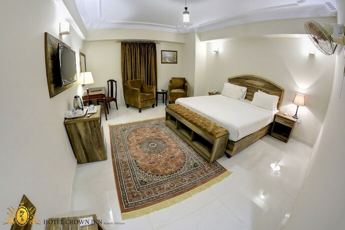 Imagen de la habitación del Hotel Crown Inn, Karachi. Foto 13