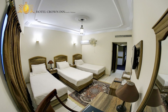 Imagen de la habitación del Hotel Crown Inn, Karachi. Foto 14