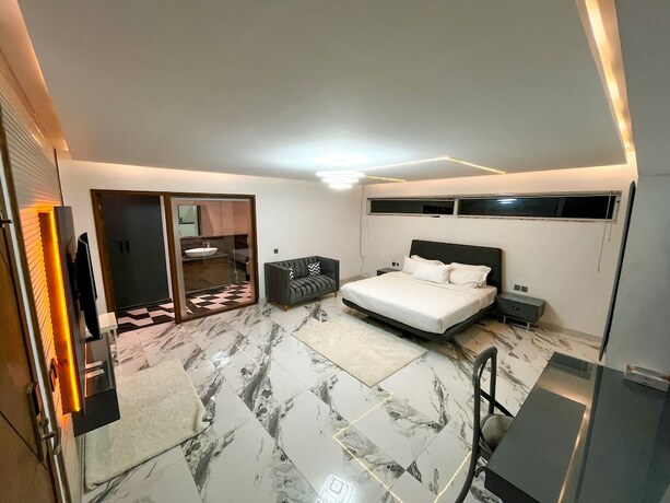 Imagen de la habitación del Hotel Crown Inn, Karachi. Foto 16