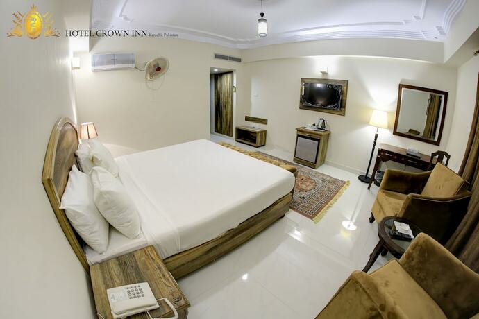 Imagen de la habitación del Hotel Crown Inn, Karachi. Foto 19