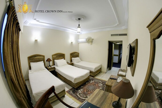 Imagen de la habitación del Hotel Crown Inn, Karachi. Foto 20