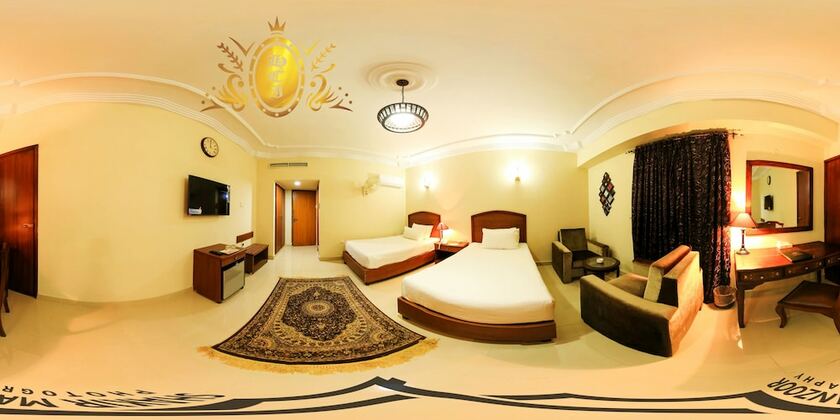 Imagen de la habitación del Hotel Crown Inn, Karachi. Foto 23