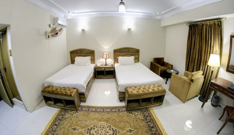 Imagen de la habitación del Hotel Crown Inn, Karachi. Foto 25