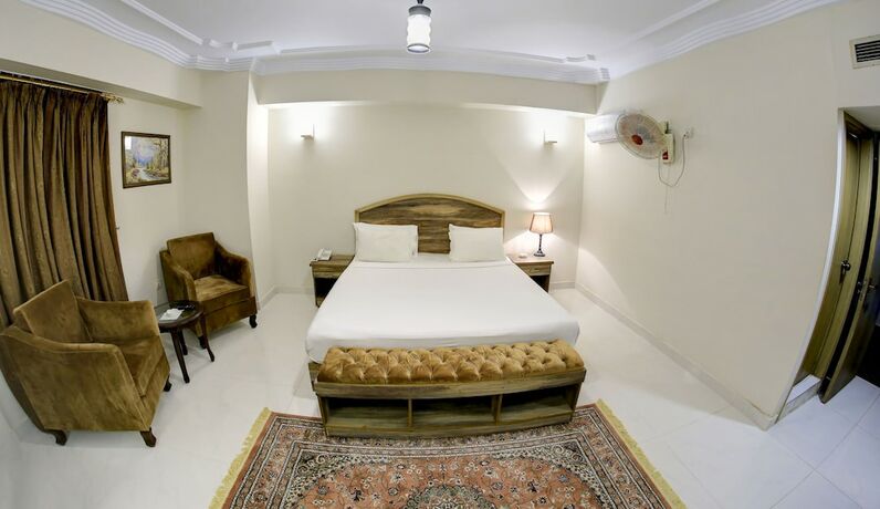 Imagen de la habitación del Hotel Crown Inn, Karachi. Foto 26
