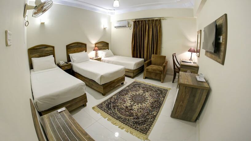 Imagen de la habitación del Hotel Crown Inn, Karachi. Foto 27