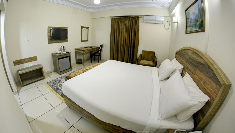 Imagen de la habitación del Hotel Crown Inn, Karachi. Foto 28
